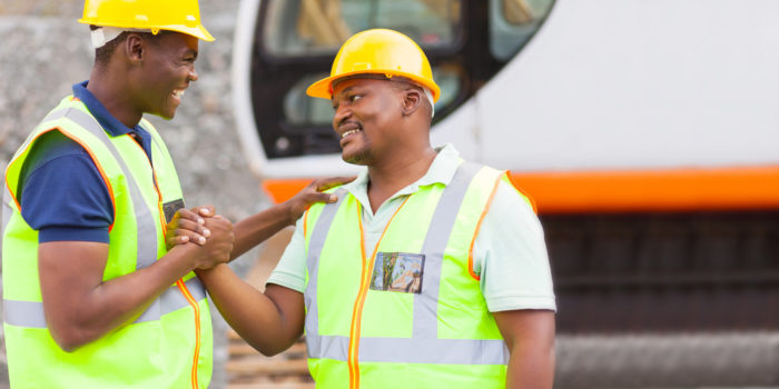 african mine workers brotherhood cheerful african mine workers hands together to form brotherhood